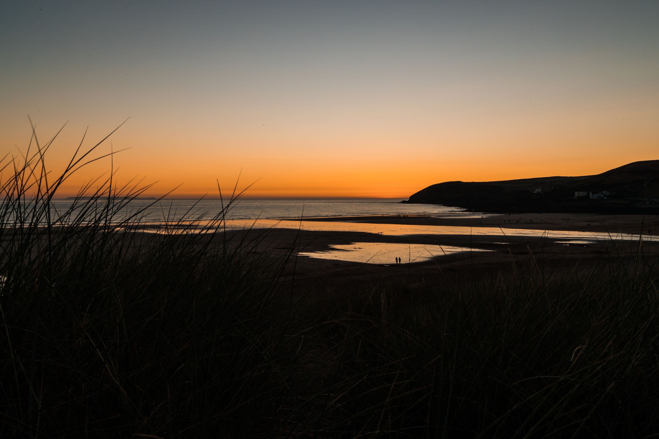 Sun setting over an english beach. 