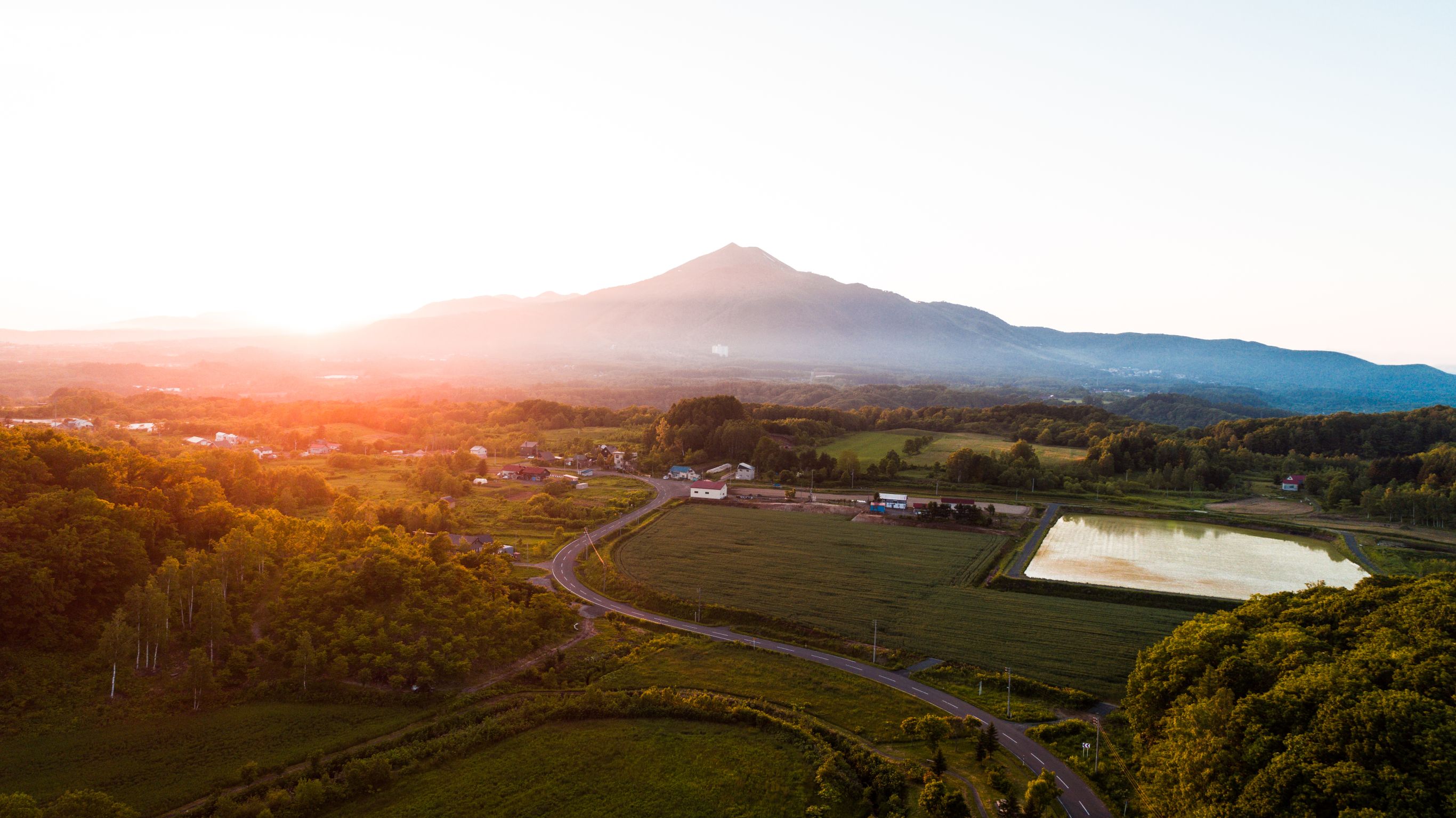 Sunset over farms and fields. 