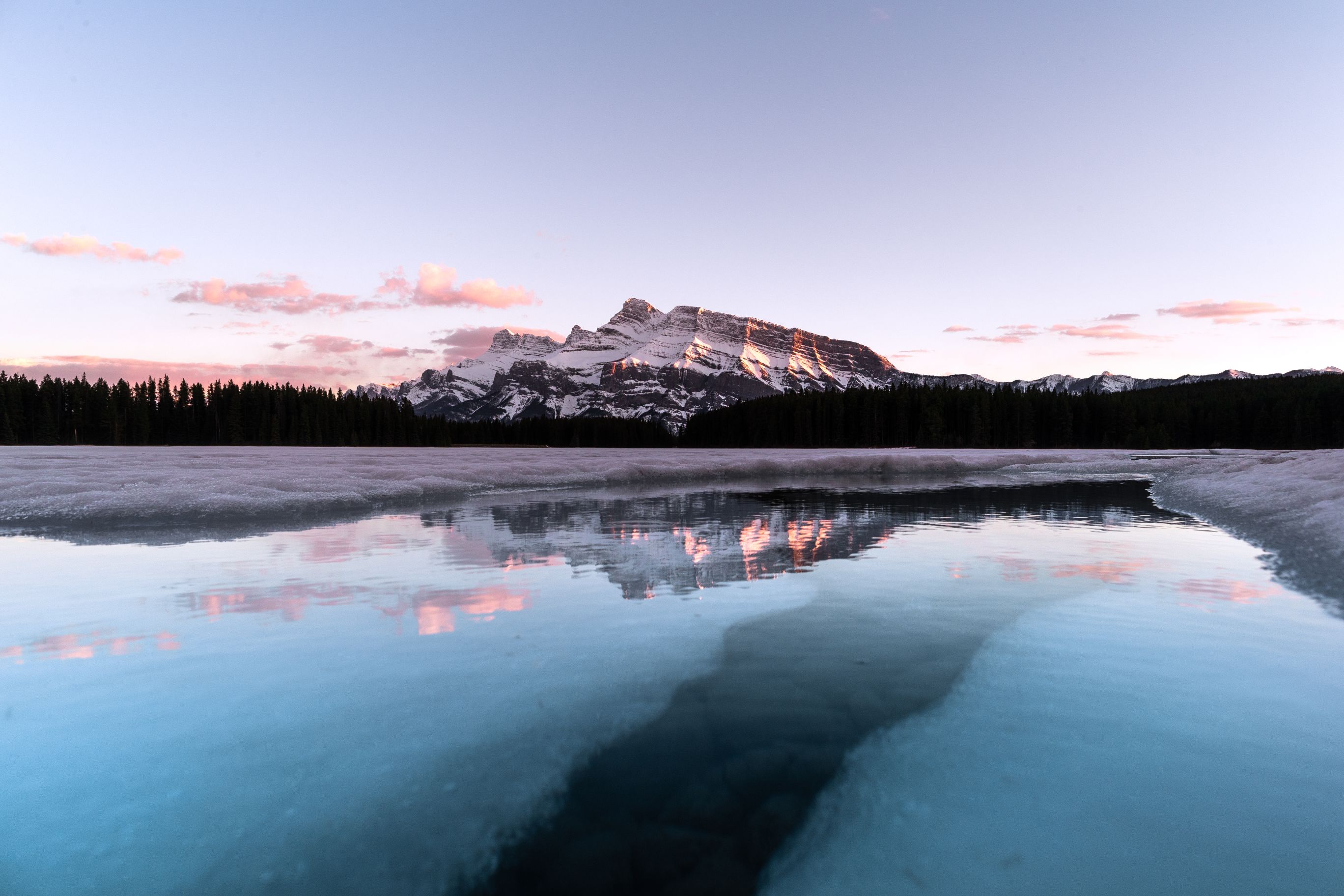 Sunset landscape of lake and mountains.